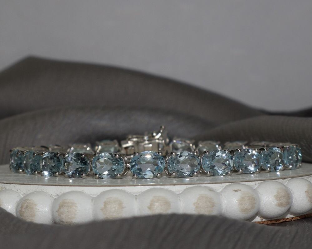 Oval Cut Sterling Silver Blue Topaz Tennis Bracelet 17.4G / 7.5in